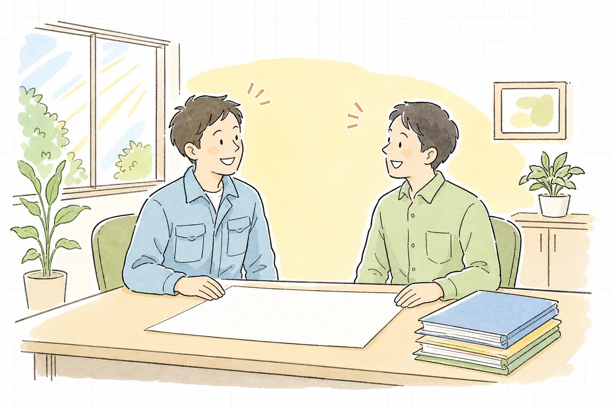 本社の会議室で、現場から来た担当者と本社の担当者が1枚の分担表を囲み、笑顔でうなずき合っている場面