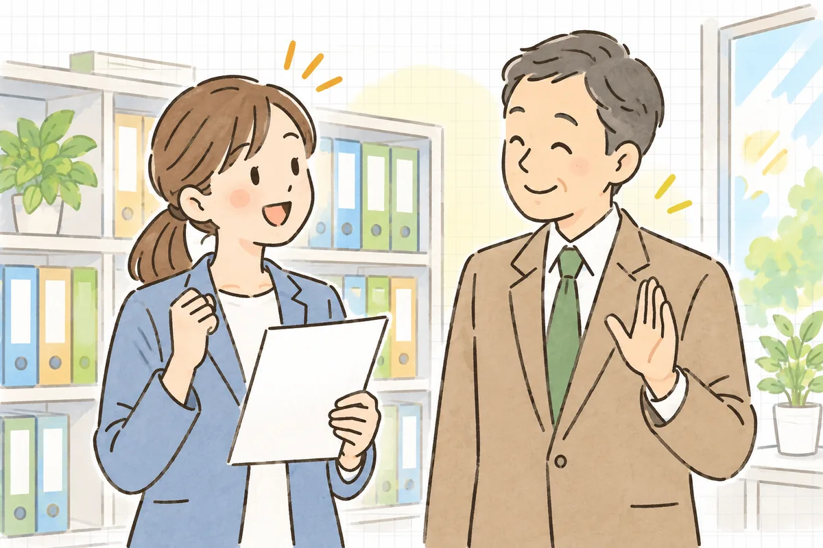 整理された書類棚の前で、新しい担当者が一覧表を手に、前任者と笑顔でうなずき合っている